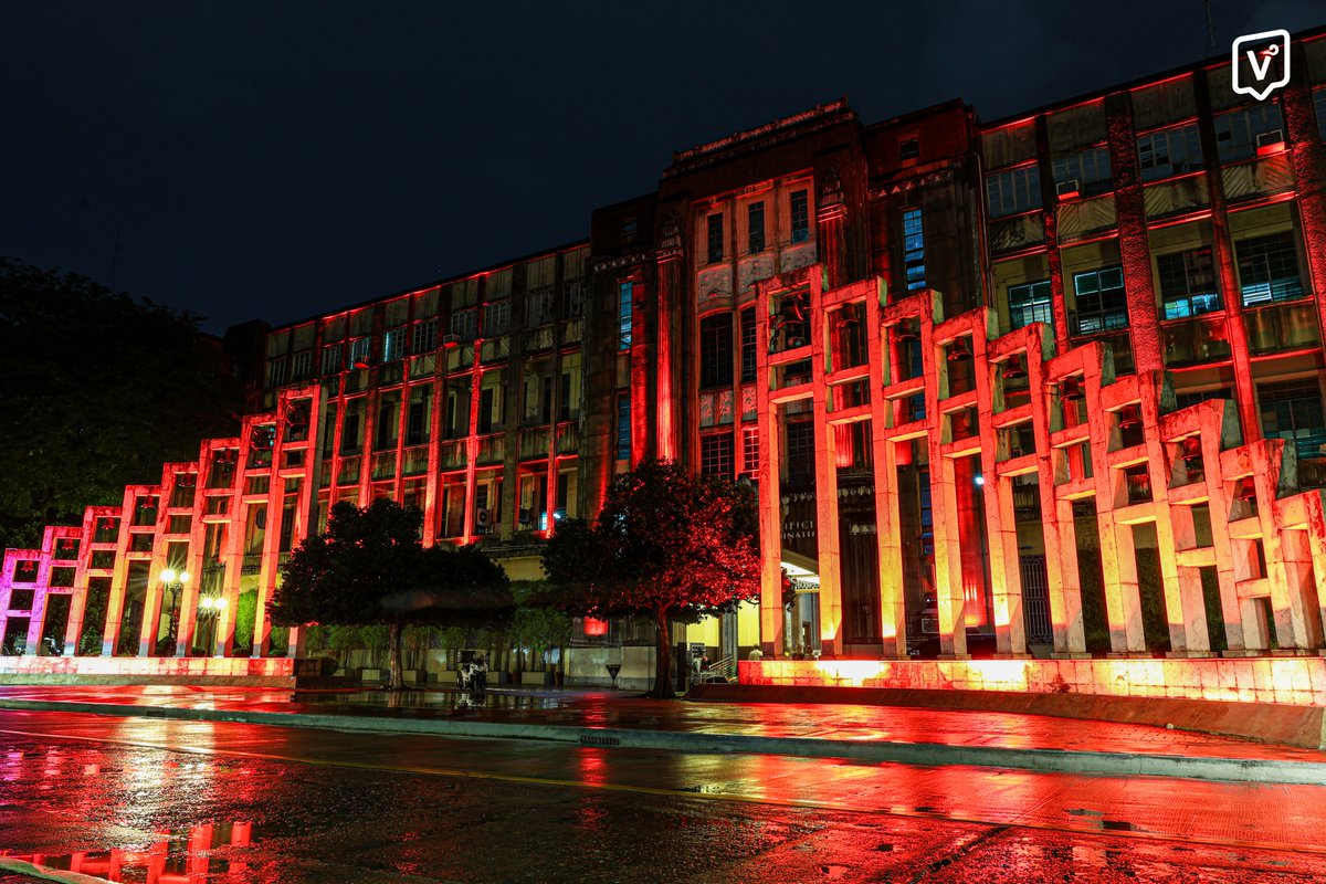 varsitarianust's tweet photo. LOOK: The UST Main Building, Arch of the Centuries, and Santísimo Rosario Parish glow red on Saturday night in commemoration of the 53rd anniversary of the Martial Law declaration on Sept. 21.

(Photos by Vio Neiro M. Villaescusa/ The Varsitarian) https://t.co/j77aOrGUyY
