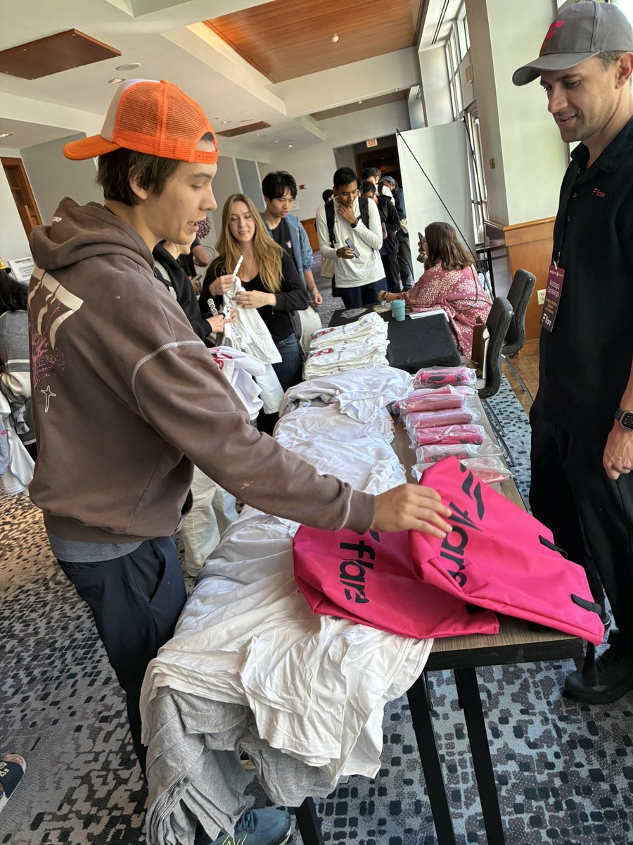 Harvard students securing their Flare bag.