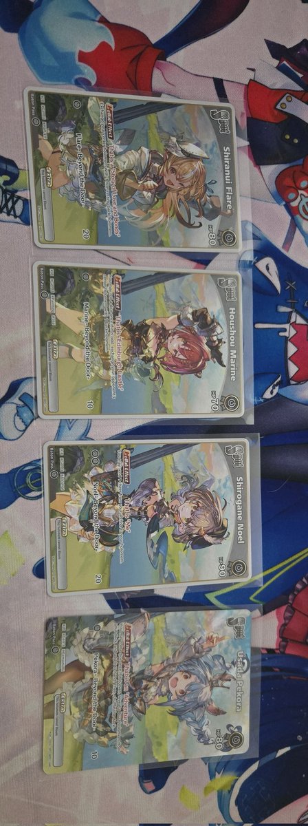 lithkast's tweet photo. @usadapekora @shiranuiflare @houshoumarine @shiroganenoel got the full set of holo fantasy including full art pekora. So happy https://t.co/TXLbpVbuY1