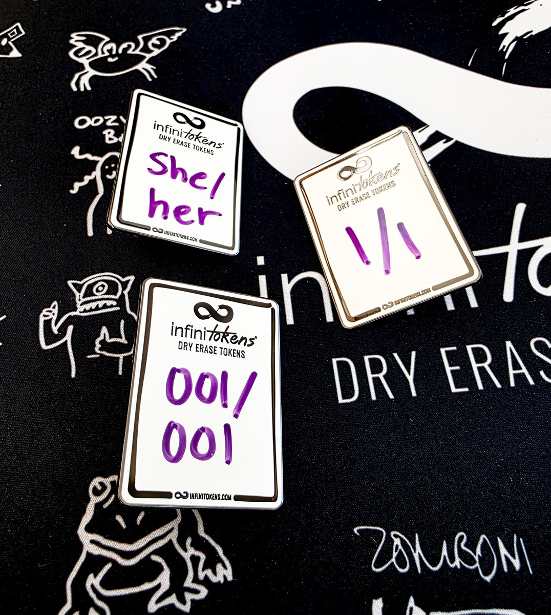 "Are the enamel pins dry erase" you ask?   

Of course they are!