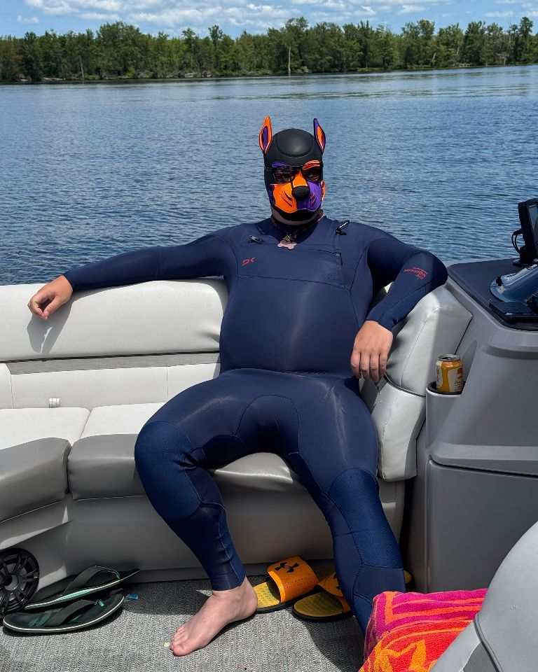 Doggo enjoying the lovely day on the water