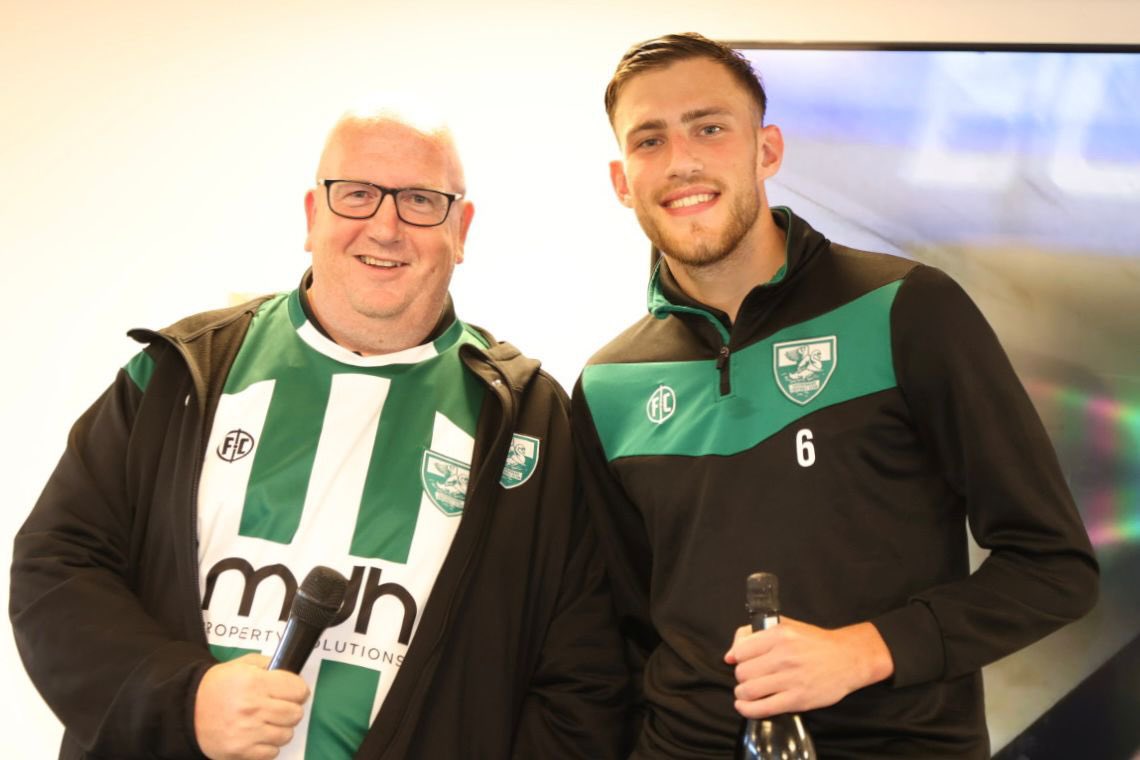 Cameron Black is presented the Man of the Match award by Richard Dore-Boize.