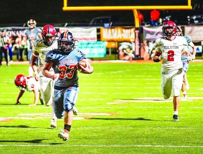 First win sweet for Tigers russell.k12.va.us/o/hhs/article/…