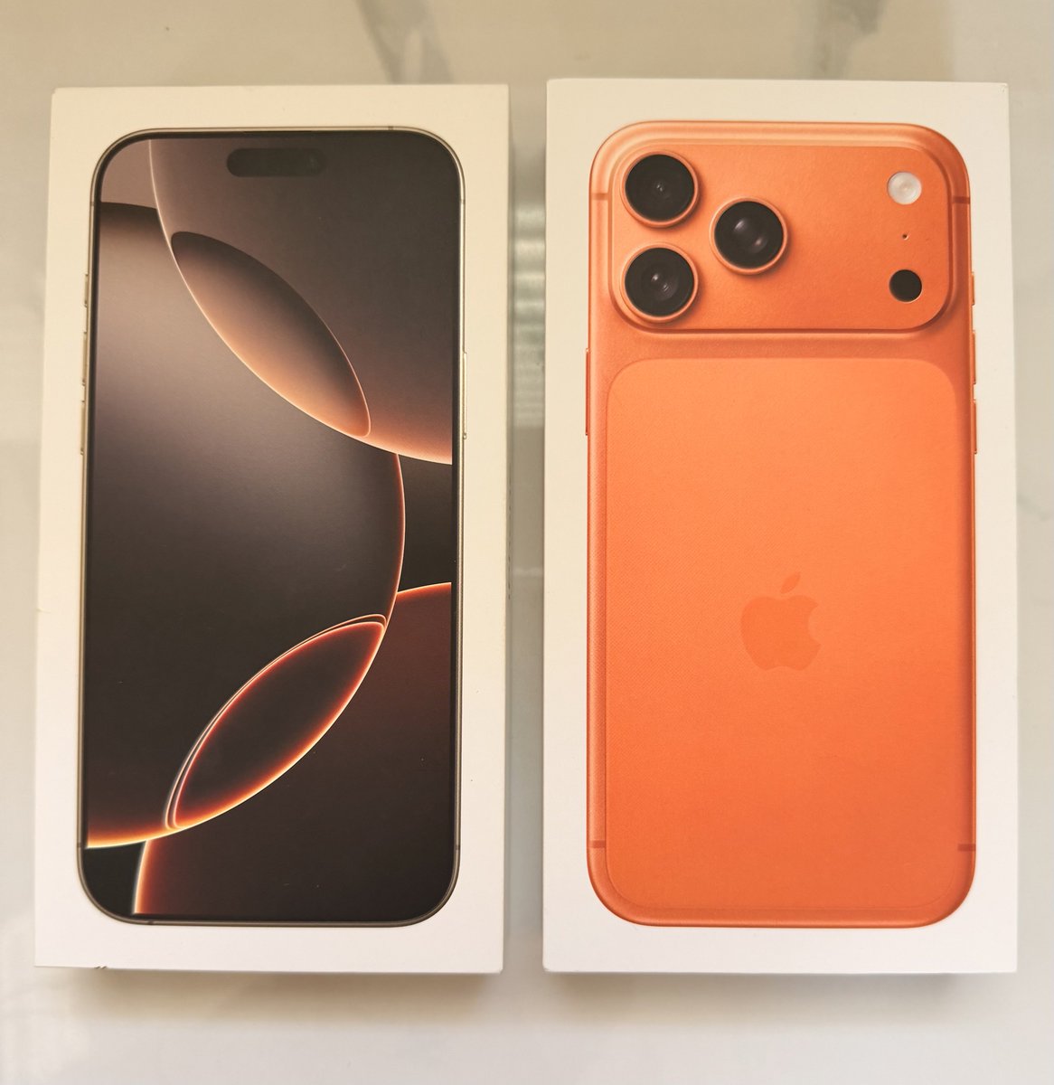 BabuNair's tweet photo. iPhone 16 Pro Max Desert Sand Titanium Sand vs iPhone 17 Pro Max Cosmic Orange Aluminum. https://t.co/LdYdHPI7Bp