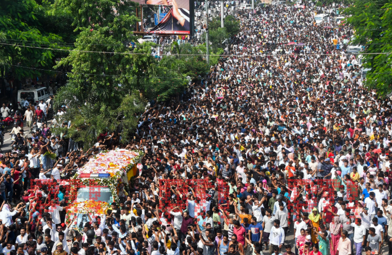 STORY | Amid heat, thousands of fans wait at Sarusajai stadium to bid adieu to Zubeen

 Thousands of grieving fans thronged the Arjun Bhogeswar Baruah Sports Complex in Guwahati's Sarusajai on Sunday to pay their last respects to music icon Zubeen Garg, whose mortal remains will