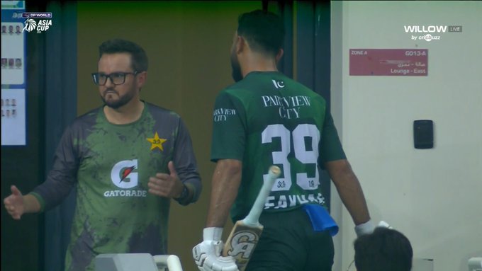 Fakhar Zaman wearing a green jersey with 