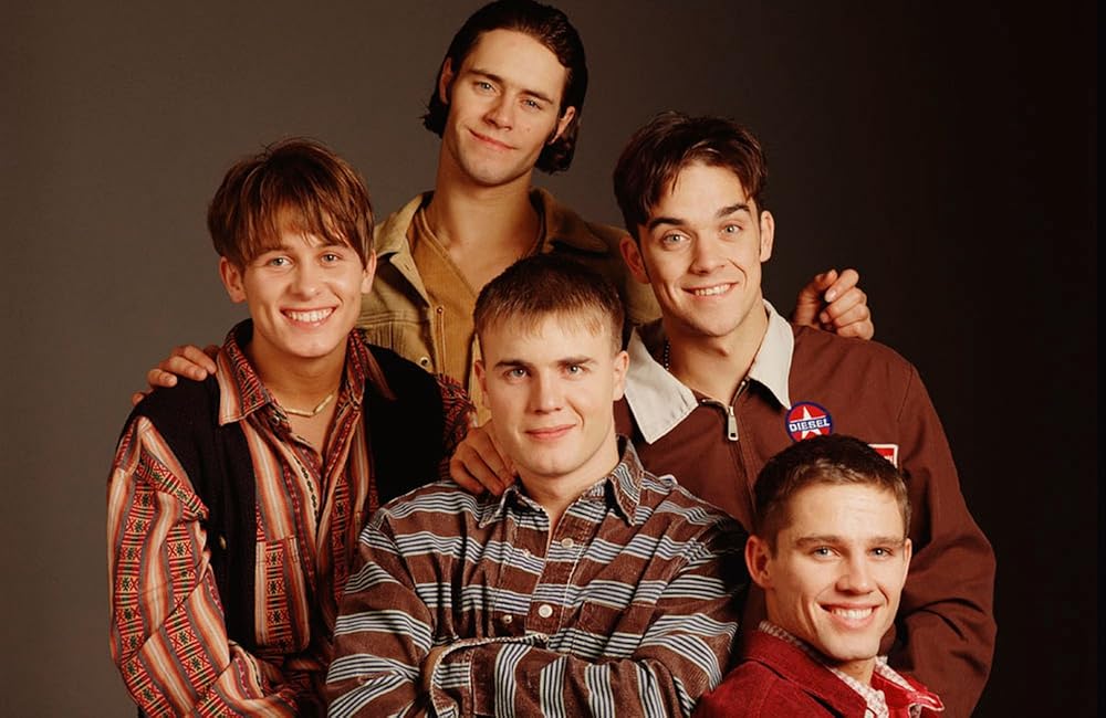 This photo of #TakeThat looks like it should be in the Kennedy household in #neighbours