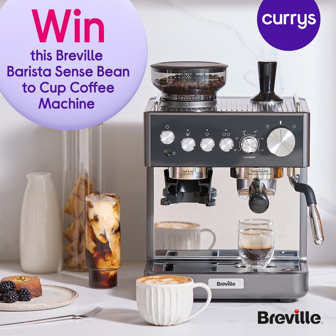 Image: https://pbs.twimg.com/media/G1_735vX0AArAL9?format=jpg&name=small A Breville Barista Sense Bean to Cup Coffee Machine on a countertop The machine is black with buttons a grinder and a portafilter Nearby are a white ceramic cup with latte art a glass of iced coffee a plate with pastries and berries and a Currys logo in the top right corner
