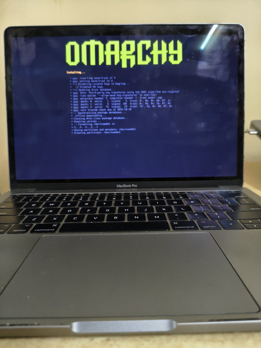 Vibhoo's tweet image. It's @OmarchyLinux time. My MBP 2017 running Omarchy in record time. Although, Mac had a screen problem I got it fixed then installed Omarchy. Absolutely loving it, few good things involve some cost. Ready to join the cult @dhh