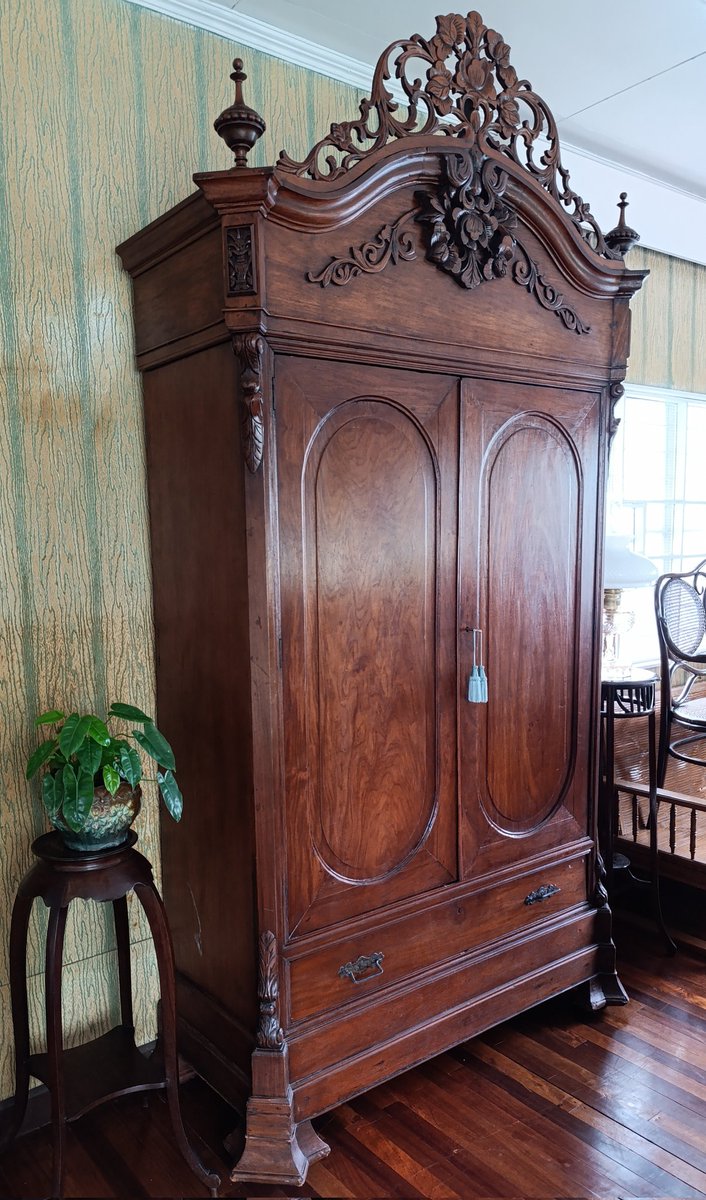 RecuerdoPinas's tweet photo. An early 20th-century Tambol Aparador made of narra wood. Its tall form suggests it once stood in an ancestral house with higher ceilings. #TambolAparador #Aparador #Narra #PhilippineFurniture #Muebles https://t.co/Gl5CfddlOO