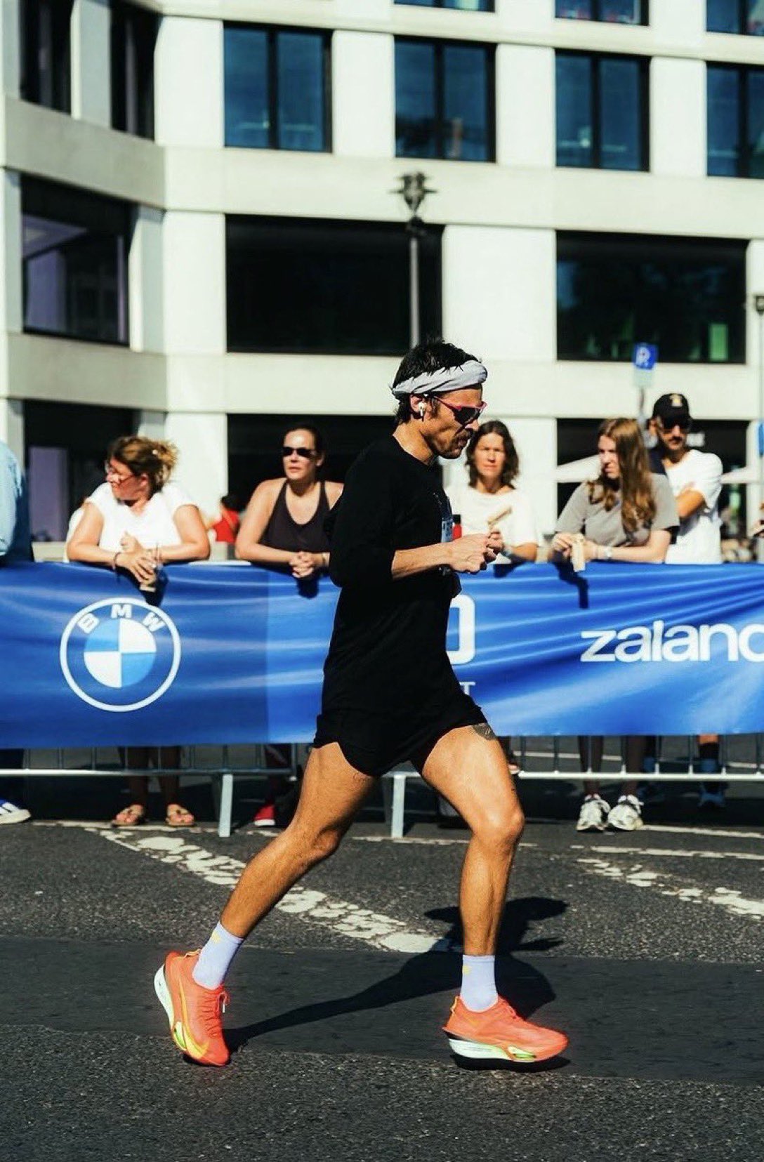 An aerial view of waves crashing against a shore.