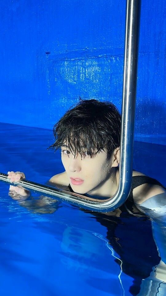 Lost in the moment, submerged in calm yet captivating energy. 🌊✨