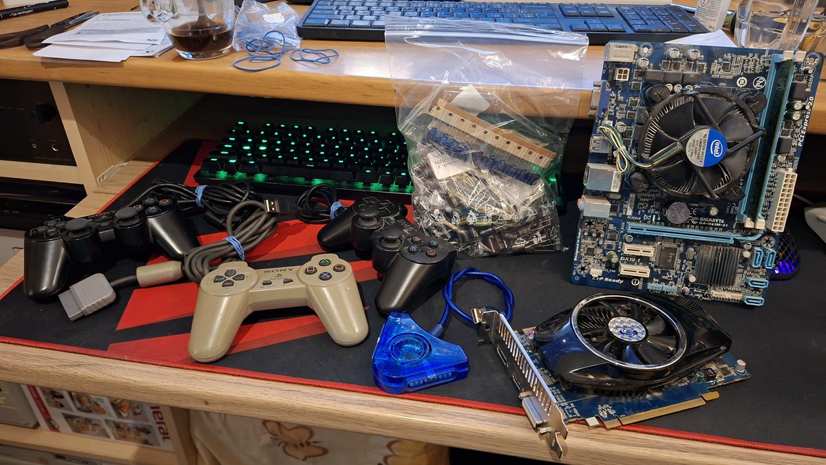 hajek_jaromir's tweet image. Monday goodies 📦📫📯 two PSX controllers, one USB gamepad, blue thing ... PC adapter for dualshock? Mini motherboard and mini GPU 🤣👉 #monday #mailcall #oldcomputers #retropc