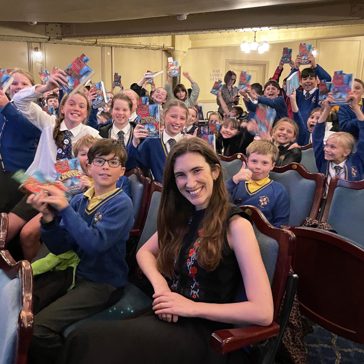 ChildrensBkShow's tweet image. We had a wonderful afternoon with Katherine Rundell at @Grand_Theatre on Friday. Katherine entertained over 1000 children with tales about the adventures she has been on to research her books. Everyone left with a copy of #ImpossibleCreatures &amp;amp; a huge grin! #TheChildrensBookshow