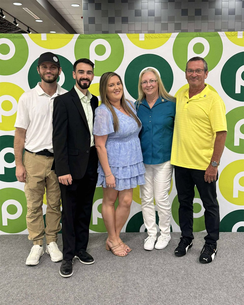 Publix's tweet photo. It’s #NationalFamilyDay! 🫶 Michael &amp; Milissa (right) have each spent 18 years at Publix, inspiring their children, Michael Jr. (left), Amanda (center), and son-in-law Reid (second from left), to pursue Publix careers. Today we’re celebrating our entire Publix family! 💚 https://t.co/iyjmdRzi0s