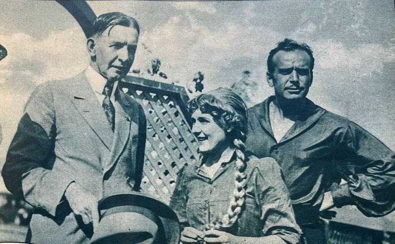 Sept. 22, 1925: Vice President Charles Dawes visits married movie stars Mary Pickford and Douglas Fairbanks on the set of their studio in Los Angeles. Fairbanks appears to be made up for his role in “The Black Pirate.”