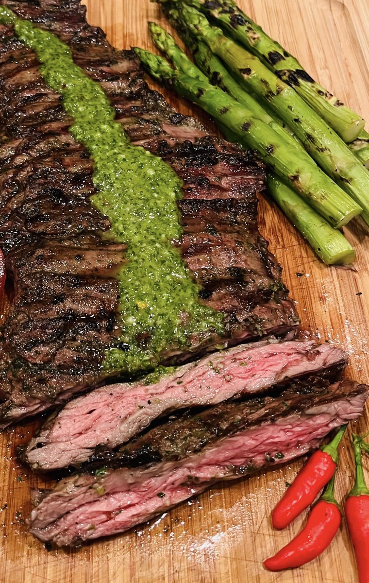 Flank steak with chimichurri sauce and grilled asparagus.  I think X is mad at me, so it’ll be interesting to see how many of you guys actually see this.