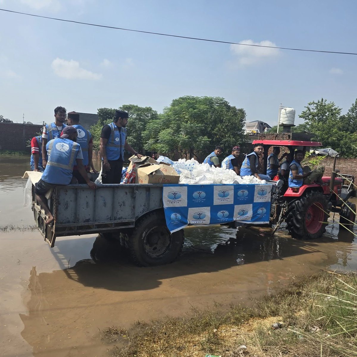HFI1995's tweet image. For several weeks, @HumanityFirstIN volunteers have been reaching out to victims of #flooding in parts of #India with emergency food and hygiene kits