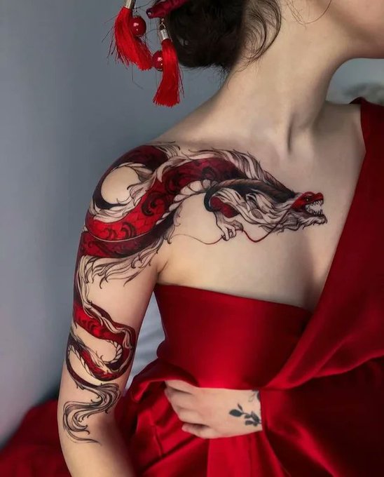 Red dragon tattoo by  tattoo__marka