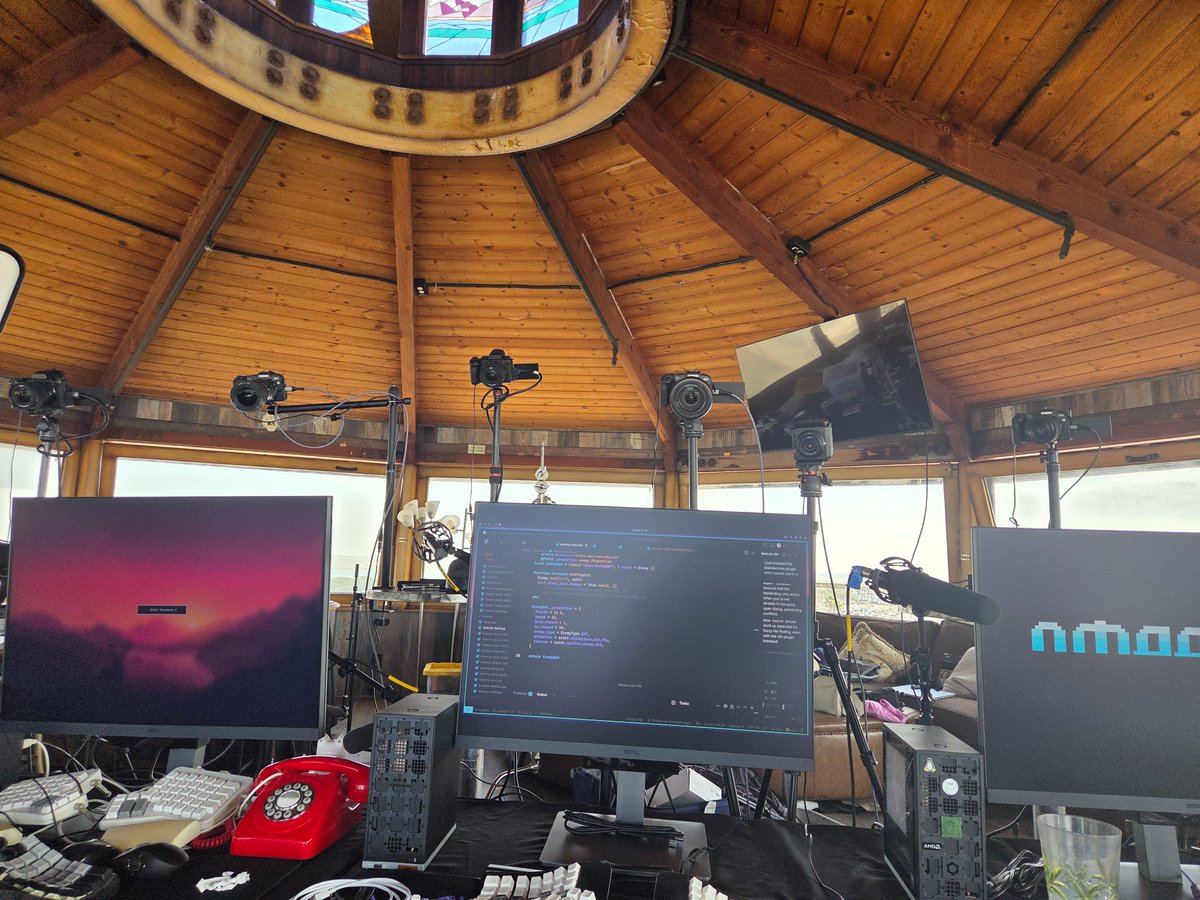 ThePrimeagen's tweet image. totally normal amount of cameras