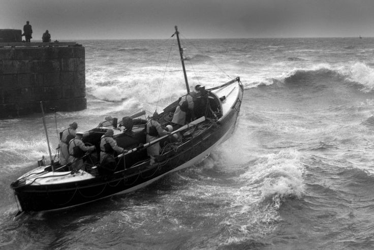 Flamborough Lifeboat leaving Bridlington Harbour in a south-easterly gale to escort local fishing cobbles back to safety, 1971, photo by Paul Berriff.