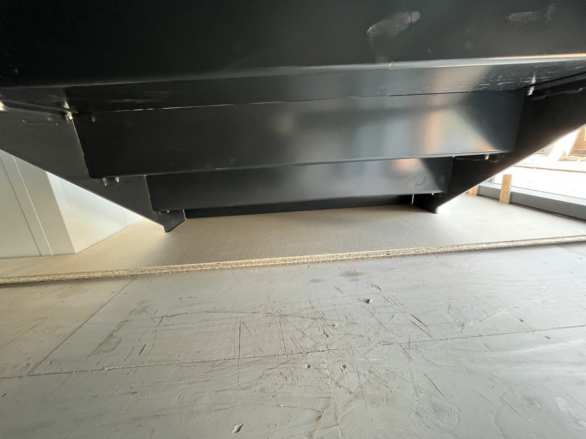 Full sheet of floating floor behind a staircase with lift , cut and scribed beautifully if I do say so myself !! Little bit of working it out to get over the staircase plates , but fits like a glove !!