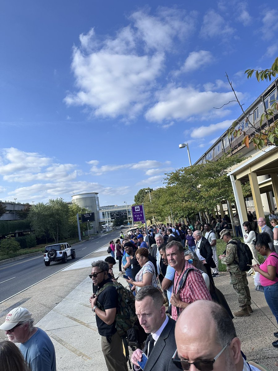 ferrispd's tweet photo. @wmata so you offloaded us, sent us to walk all around the station to wait in a mass of people for shuttles that never came.  No WMATA employees show up for several minutes and when they do they send us all back to the platform. https://t.co/ZEB02CsZts