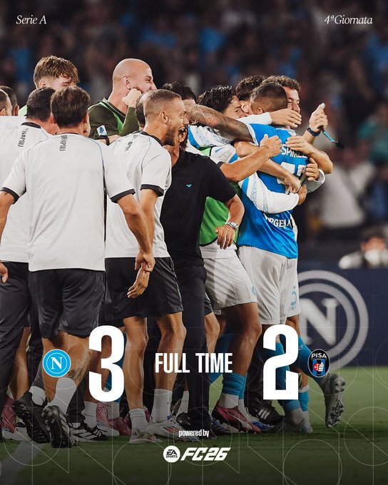 Soccer players in white and blue jerseys celebrating on a field, hugging each other. A referee in black stands nearby. The scoreboard shows Napoli 3, Pisa 2, with "FULL TIME" displayed. The SSC Napoli logo is visible on the field.