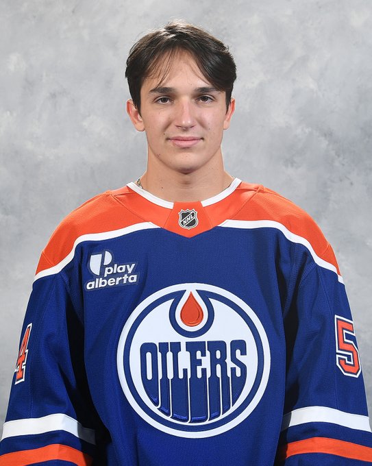 Head shot of Tommy Lafreniere in a blue Oilers jersey