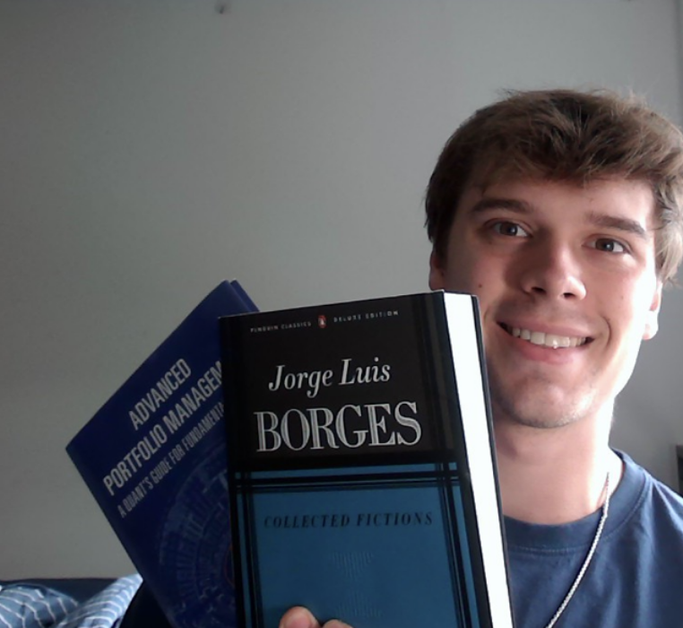 __paleologo's tweet photo. A student holding a copy of a masterpiece. 
The other one is my book. https://t.co/grMeAqULGj