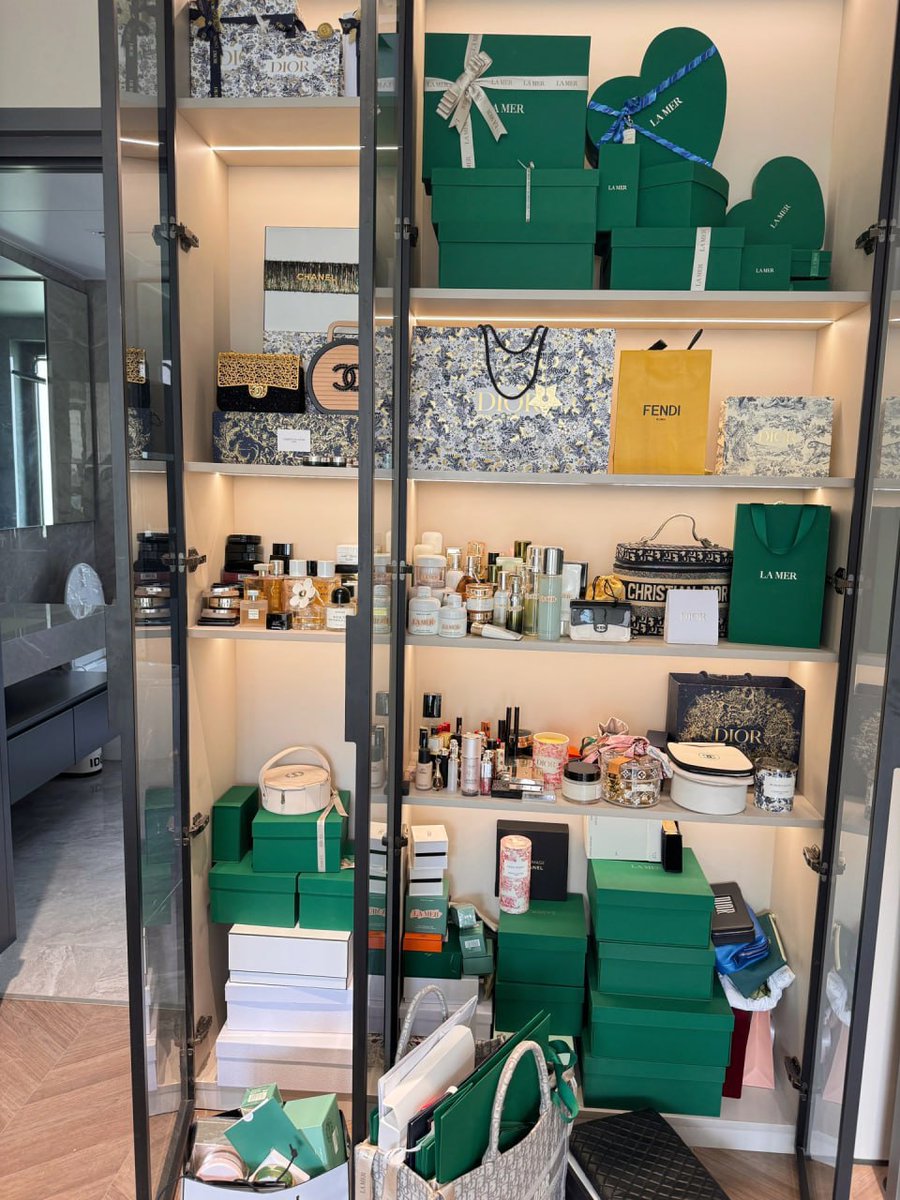 "A shelf full of luxury – Dior, La Mer, Chanel, Fendi, and endless elegance. 💚✨ #LuxuryLifestyle #DesignerBeauty"