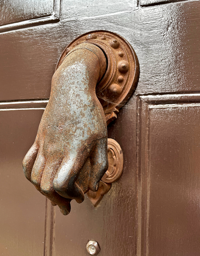 Yet another of Hookland's infamous knockers. This one at 14 Pope Joan Street in Ashcourt is apparently possessed by a mind or a spirit of its own. In the summer of 1976, BBC Nationwide's cameras caught it briefly rapping on the door without any obvious human interaction.