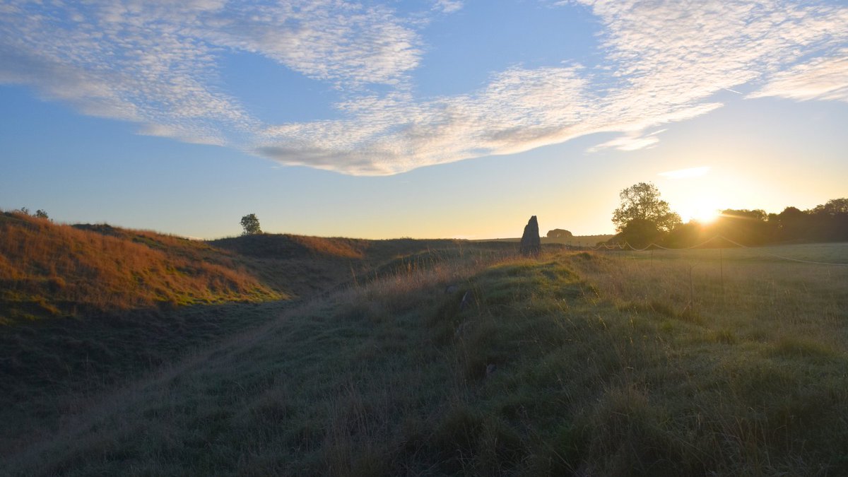 Stepping into Autumn. Sunrise over the henge bank at Avebury this morning.