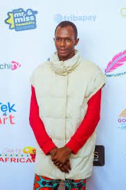 frankedoho's tweet image. When Daniel Regha wore this to an event, what was African Culture was he showcasing? 
You’re calling other people un-African, yet you came here looking like a lost Eskimo starring in a duvet advert from IKEA. 🤣