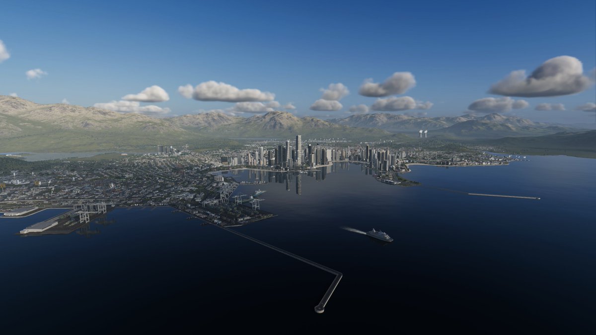 #CitiesSkylines2 The port city is surrounded by distant mountains.