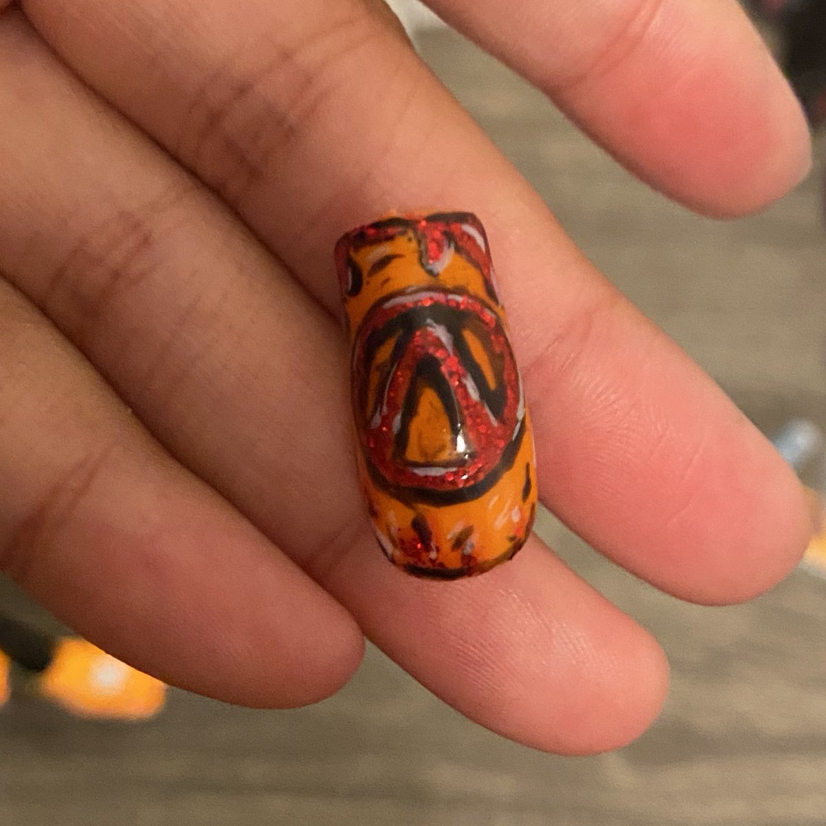 Been playing borderlands 4 and felt like practicing nail art! The cryo and vault symbol nails change color depending on the temperature. Took about 3 hrs to finish 3 nails so I’m going to take my time. What should I put on the other nails? 🤔

#borderlands4 #nailart #borderlands