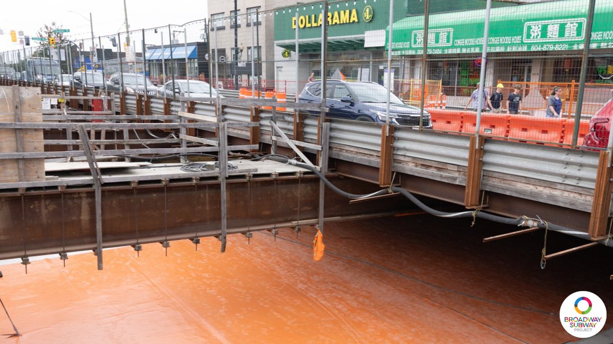 Can you see the orange cover at Mount Pleasant Station, just below Broadway? This is a waterproofing layer that will help keep the future station dry.

Fun fact: crews are installing more than 13,000 square meters of waterproofing for this station!