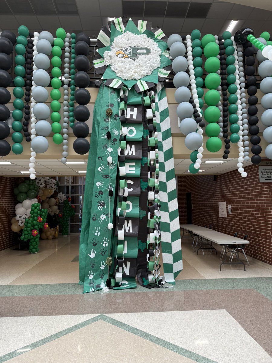 The giant Homecoming mums are COMPLETE! 🎉 Each advanced class designed their own from start to finish with troubleshooting, hot glue battles, glitter explosions and all. Proud teacher moment 💚🖤 #ProsperProud <a href="/ProsperHS/">Prosper High School</a> <a href="/prosperCTE/">Prosper CTE</a> <a href="/JimmyFrideley/">Jimmy Frideley</a>