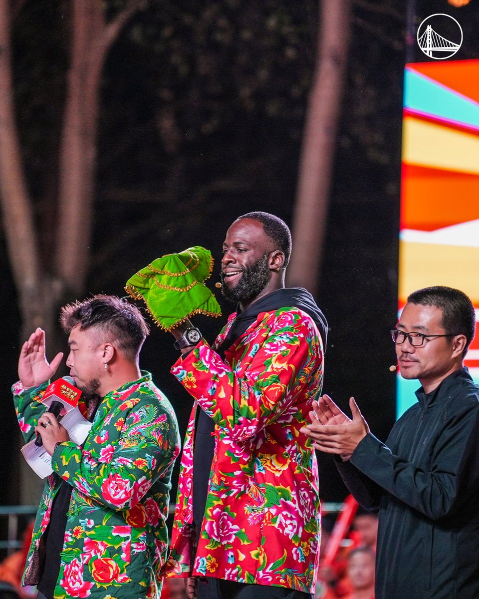 warriors's tweet photo. Draymond taking in the sights and sounds of China 🇨🇳 https://t.co/IKtaLBIwsA