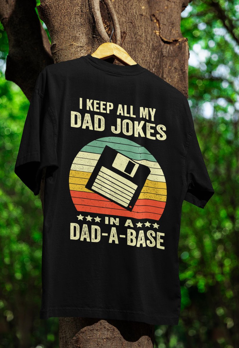 PopRetroDream's tweet image. Upgrade his humor with our Dad-A-Base Floppy Disk T-Shirt, a perfect gift for tech dads. This Gildan Softstyle tee blends 90s nostalgia … retrovintagestyle.store/listing/430806… #techdad #dadjokes #90snostalgia #programmergift