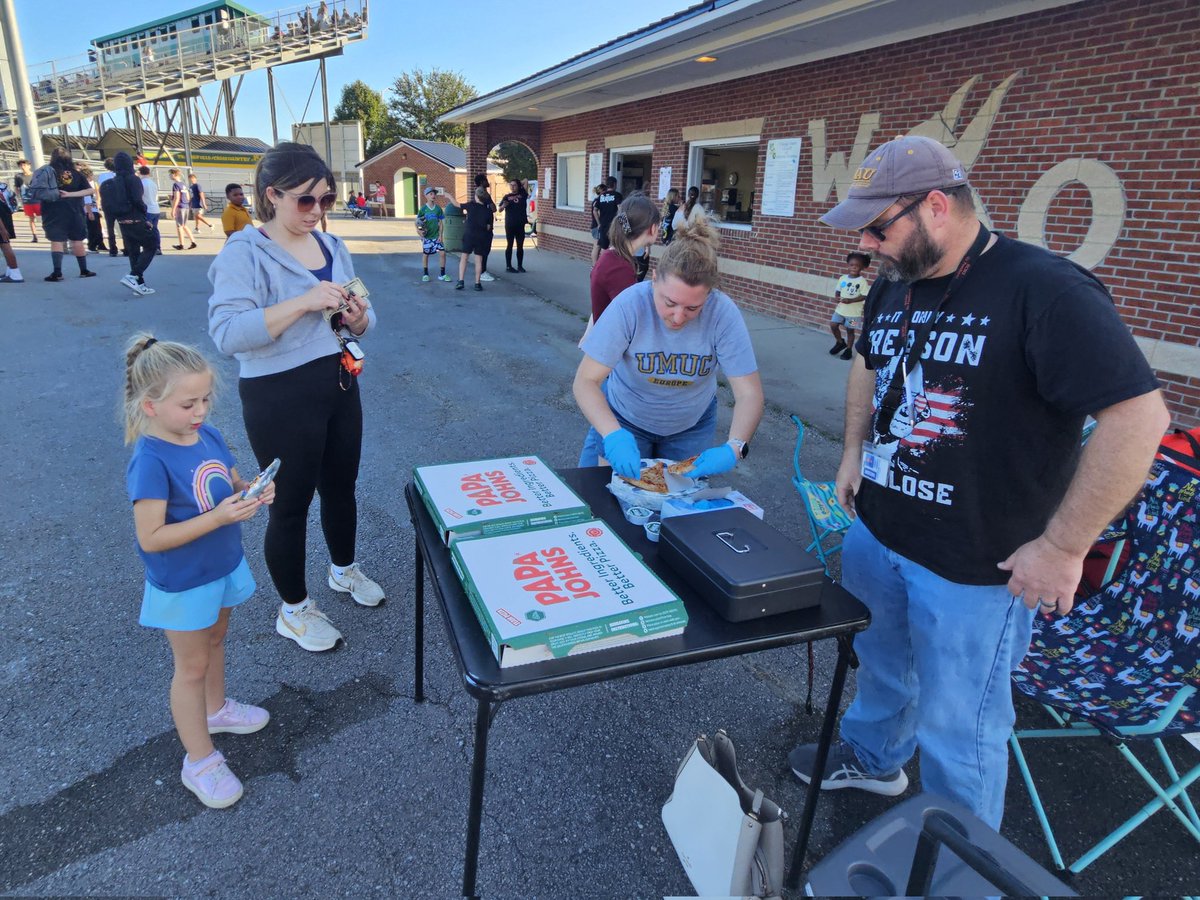 Getting a slice and supporting our 8th grade DC trip.