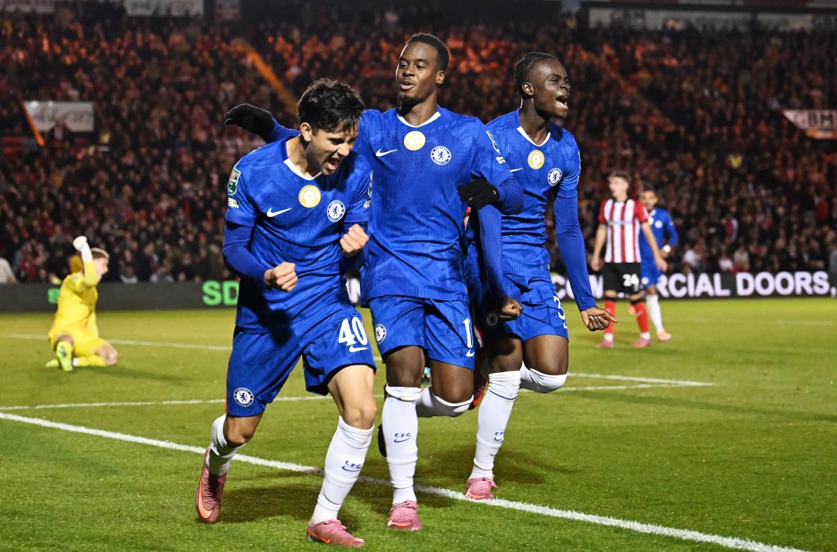 Lincoln City vs Chelsea football match in stadium