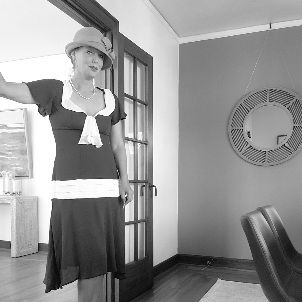 About 5 years ago I decided to match my open house attire to the era of a 1929 house I had listed for a client and done a ton of work on. 

At first I felt silly and self conscious. I didn't want to be looked at like it was a costume. 

But then something funny happened. 

A guy