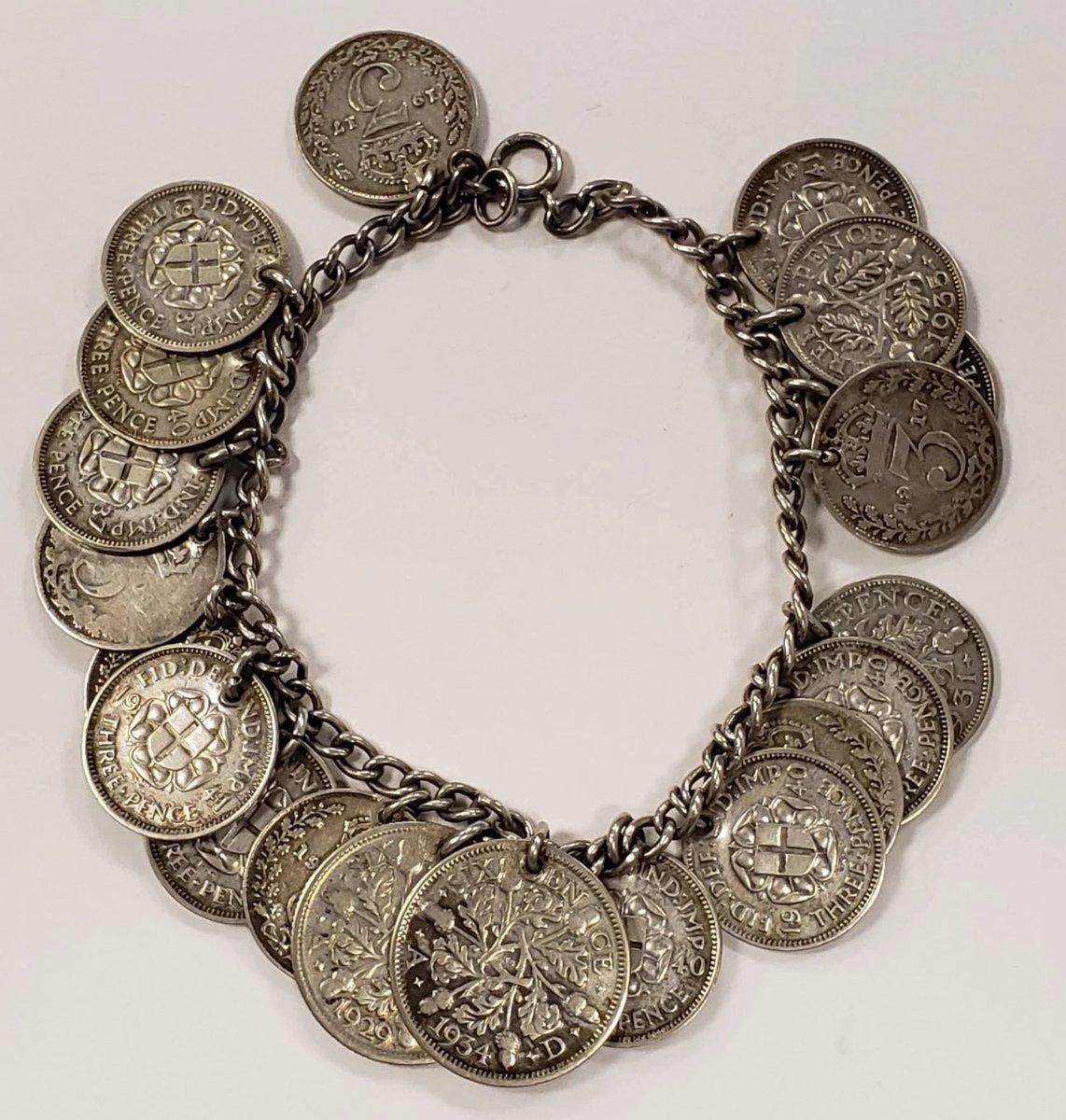 Bought myself one of the coolest pieces of world war 2 trench art I’ve ever seen today.. some soldier sat in a trench and drilled through the silver coins he received as payment then brought this piece of history home with them…

I can’t wait to wear it.