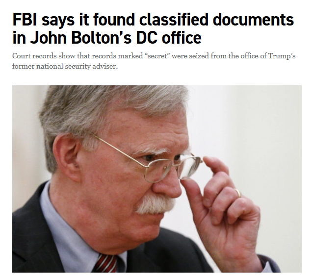 John Bolton, an older man with gray hair and a mustache, wearing glasses and a suit, adjusting his glasses with his hand. The text overlay reads "FBI says it found classified documents in John Bolton’s DC office" and "Court records show that records marked ‘secret’ were seized from the office of Trump’s former national security adviser."