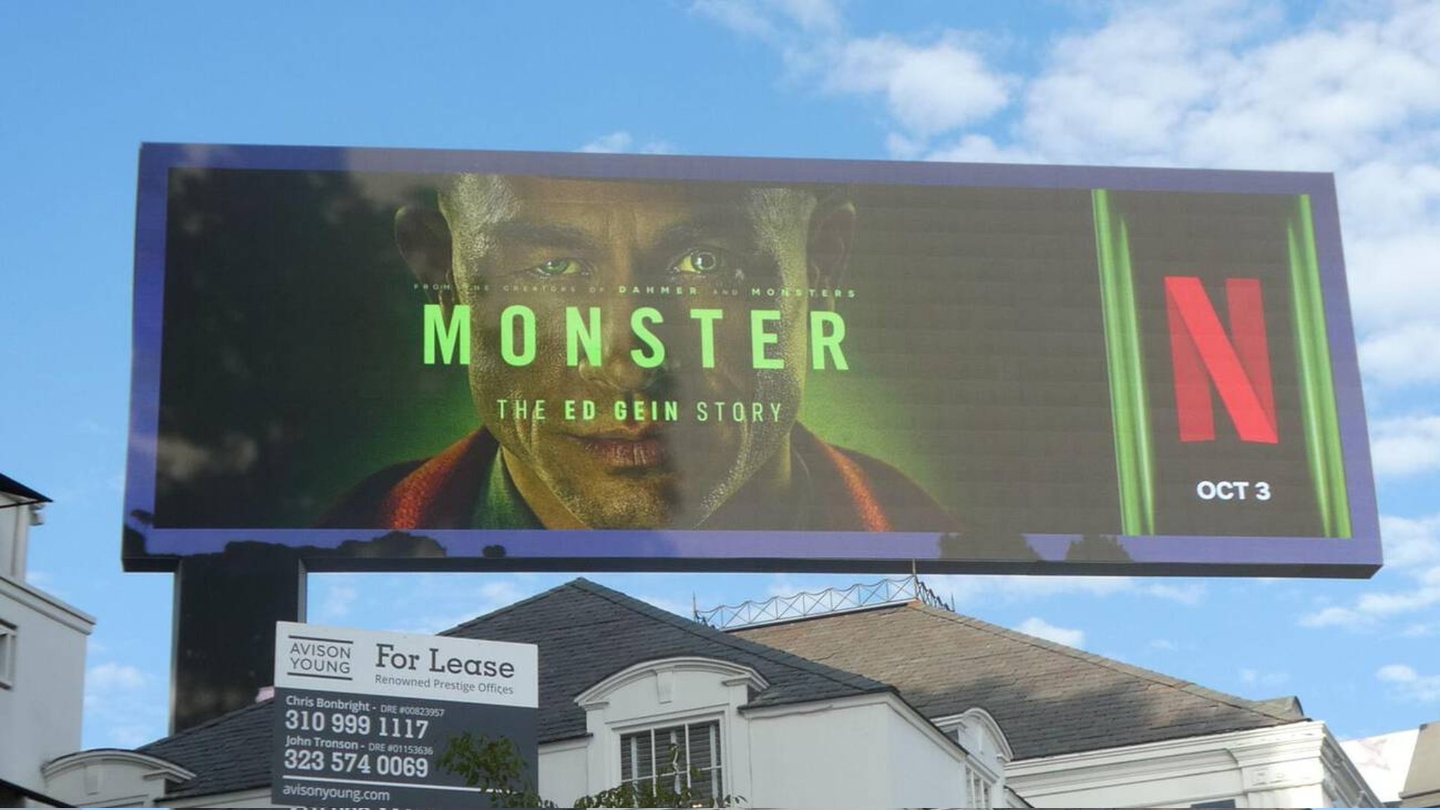 Netflix MONSTER storefront wrap — left panel with green gradient and large N