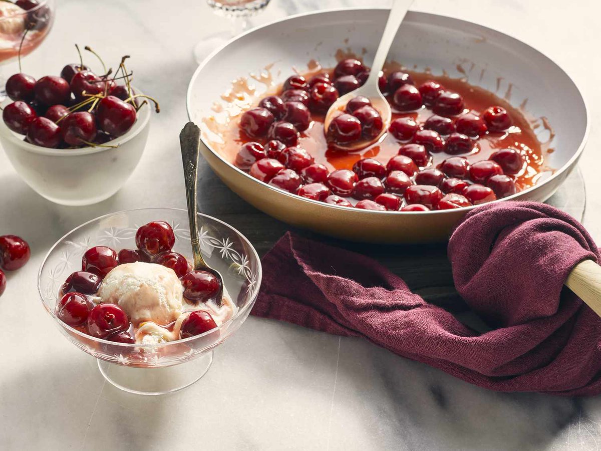 It’s National Cherries Jubilee Day, a dessert created by Escoffier for Queen Victoria's Diamond Jubilee. Check out the easy #recipe and make it at home. Flaming the cherries in the pan (flambé) is optional. t.ly/0XpwU