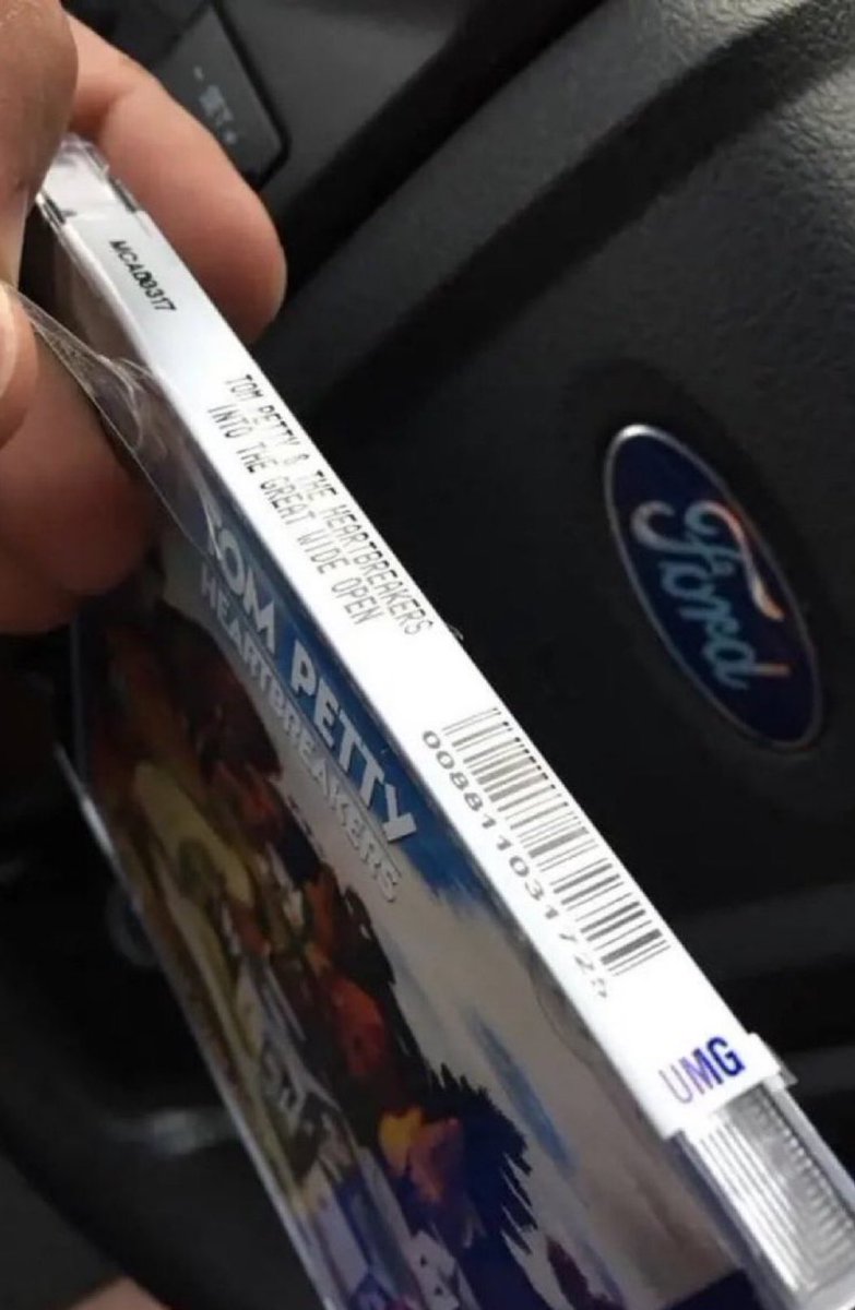 Throw up a hand if you remember the struggle of peeling the fucking sticker off a new CD …