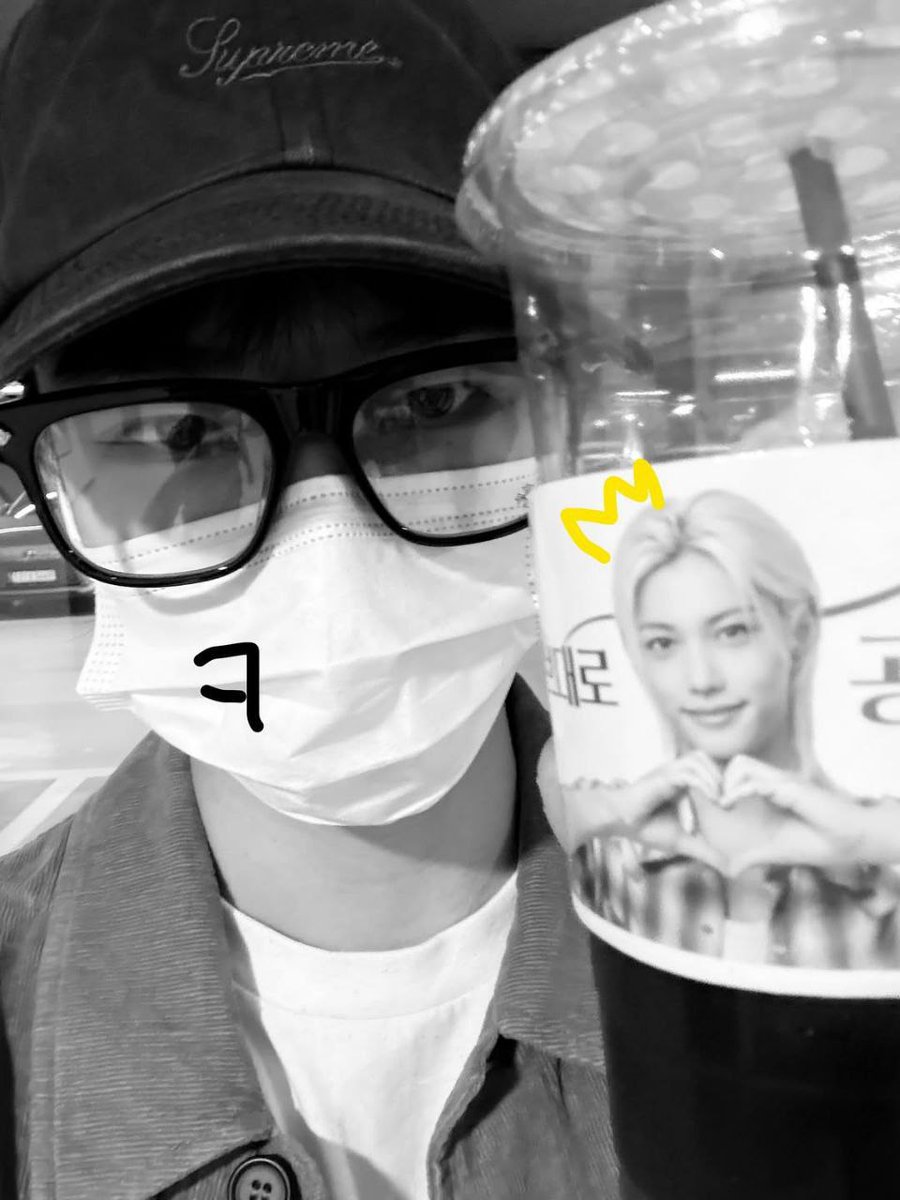 Mask on, cap low, and a coffee (Felix) in hand keeping it casual but still making it a whole mood. No need for big words, just a snapshot that says it all, low key vibes, cool energy, and a little humor to top it off.