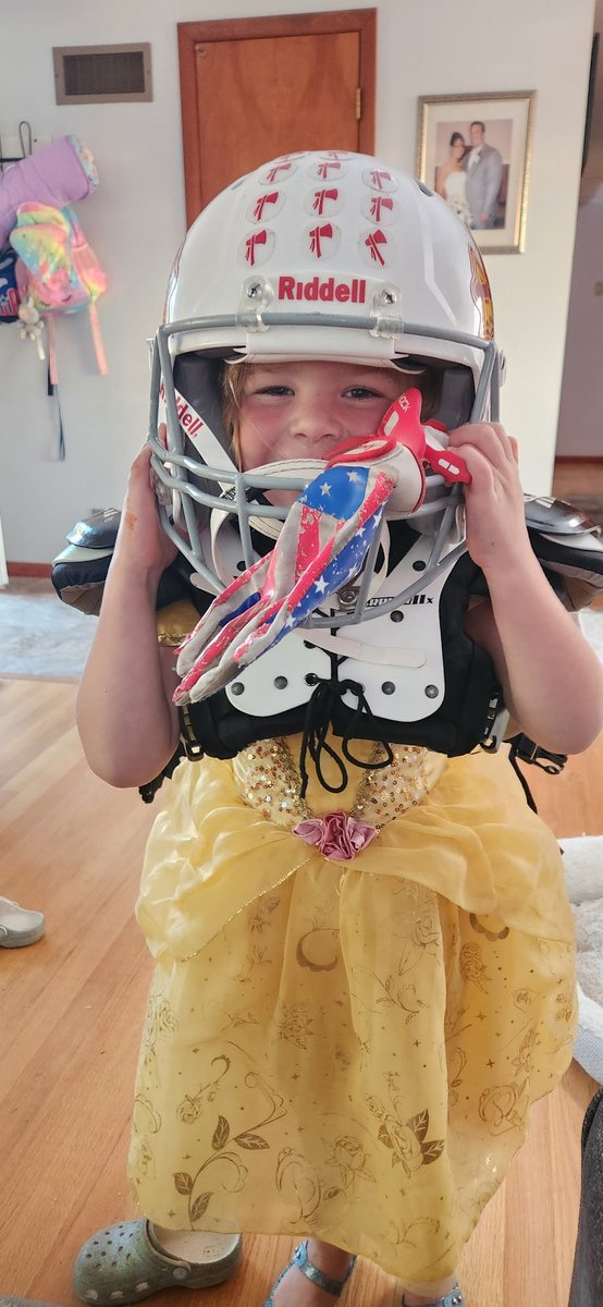 This picture absolutely sums up my girl. The princess who will knock your teeth out lol.